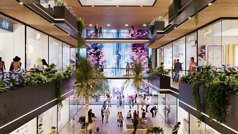 Many people are seen walking, shopping, or relaxing in the central common areas.